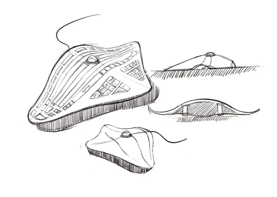 Pen sketches of the keyboard's early form from several angles.
